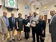 Recognition of Merit Board members and their service - Nicholle Harrison and Eddie Chubb