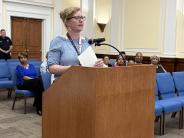 Kate Harman accepts a proclamation for Agriculture Week and National Agriculture Day