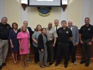 Deputy Bruce Edmondson, wife Michelle, daughter Kayla, FCSO staff and BOC